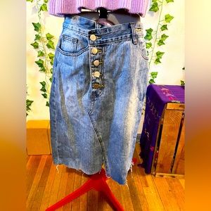 Jean skirt. High rise with asymmetrical button up detail